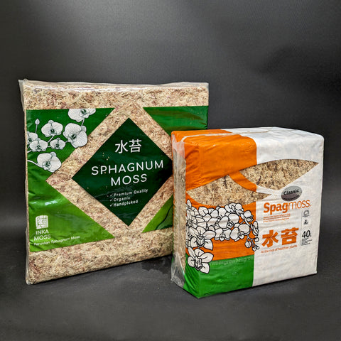 Two bags of long fibered sphagnum moss with a green labeled bag on the left and an orange white labeled bag on the right